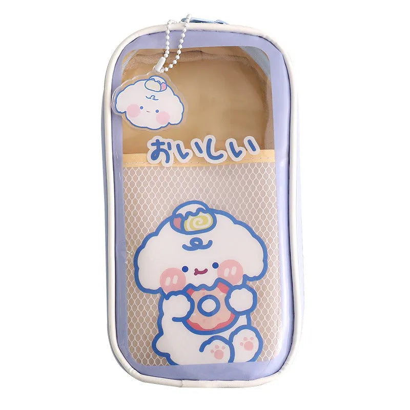 Transparent PVC pencil case with cartoon design showing large capacity interior and zipper closure