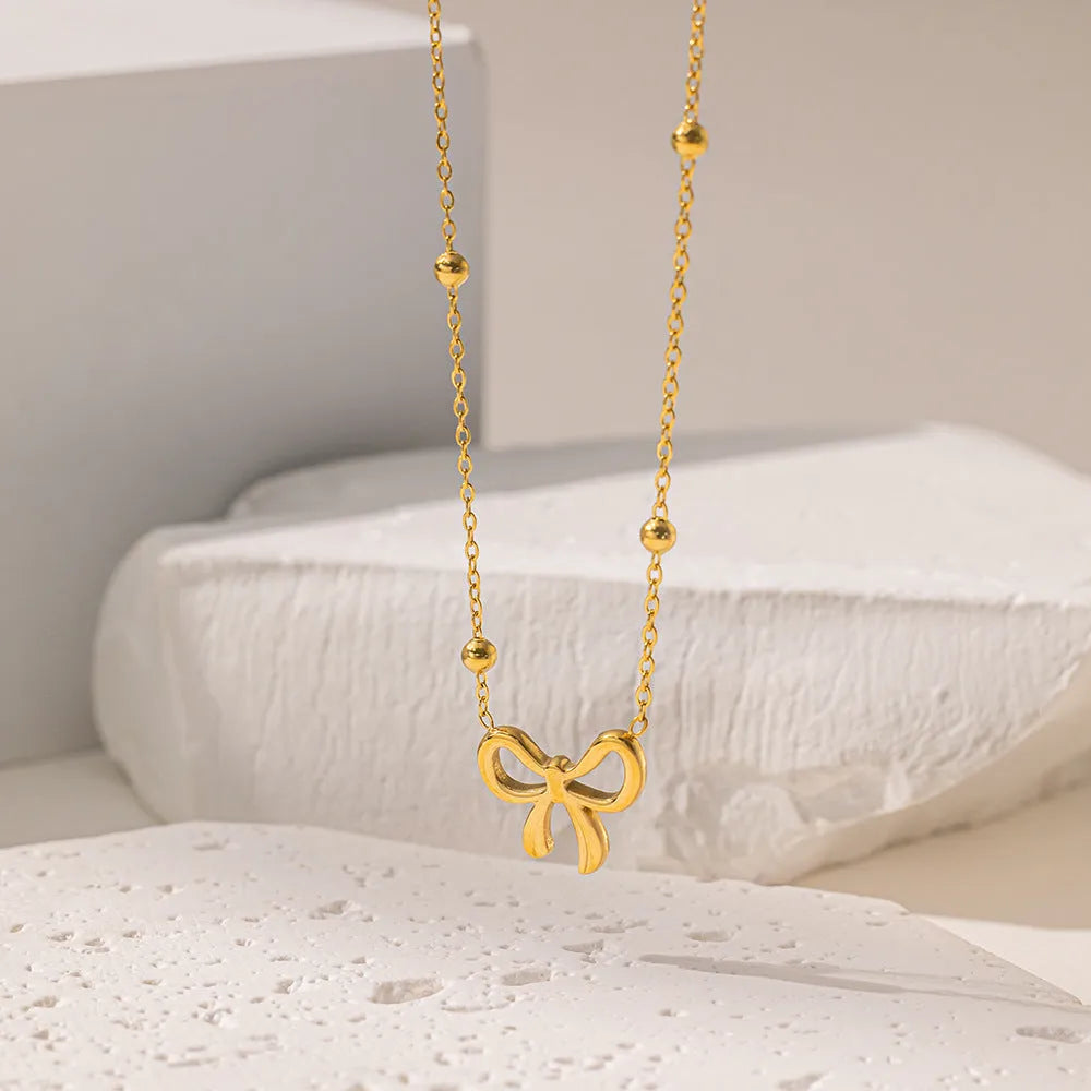 Gold bow necklace with cross chain design adjustable 41-50cm length titanium steel women's fashion jewellery