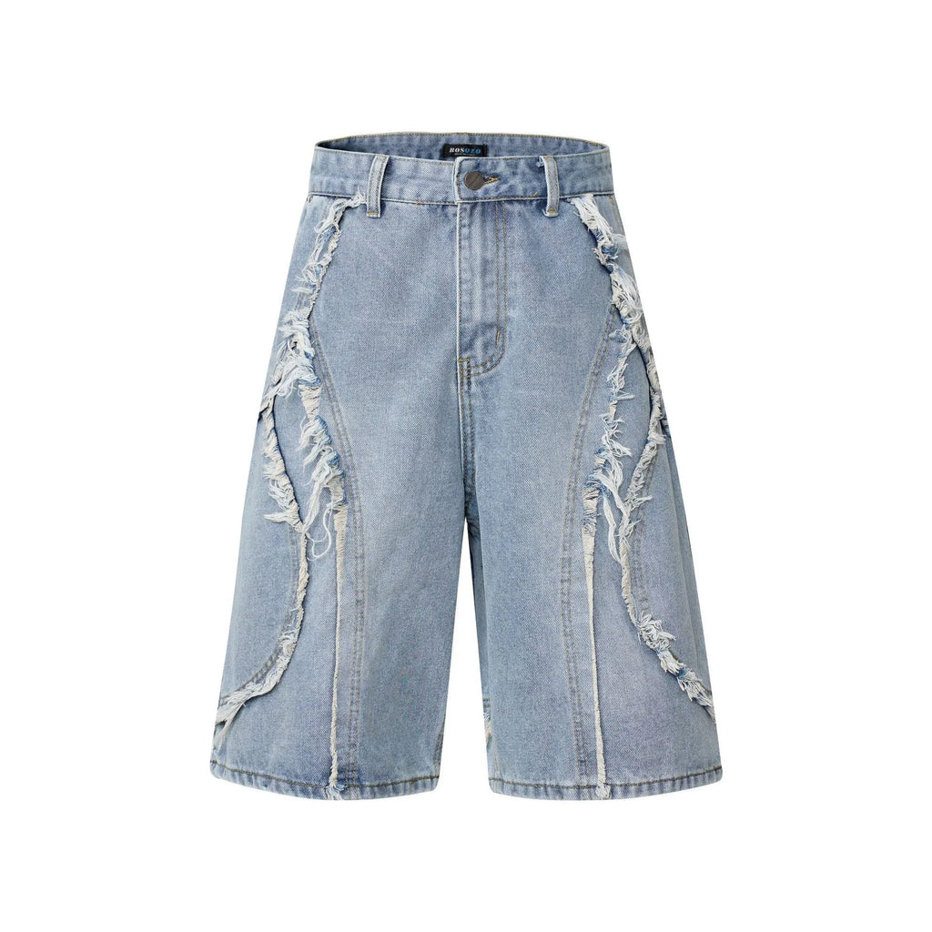 Distressed denim shorts with raw-edge hems in black, shown in a straight-leg cropped fit.