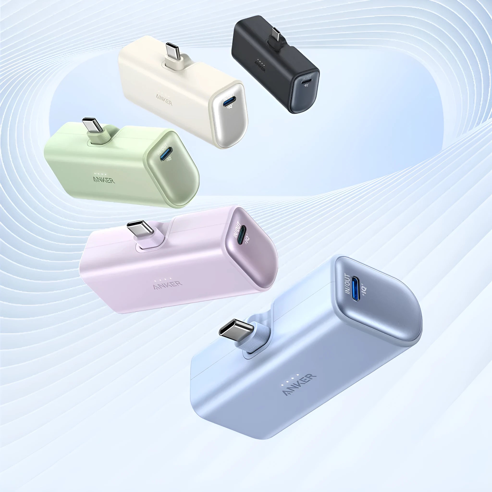 Compact capsule power bank with foldable USB-C head in black white green blue pink colours