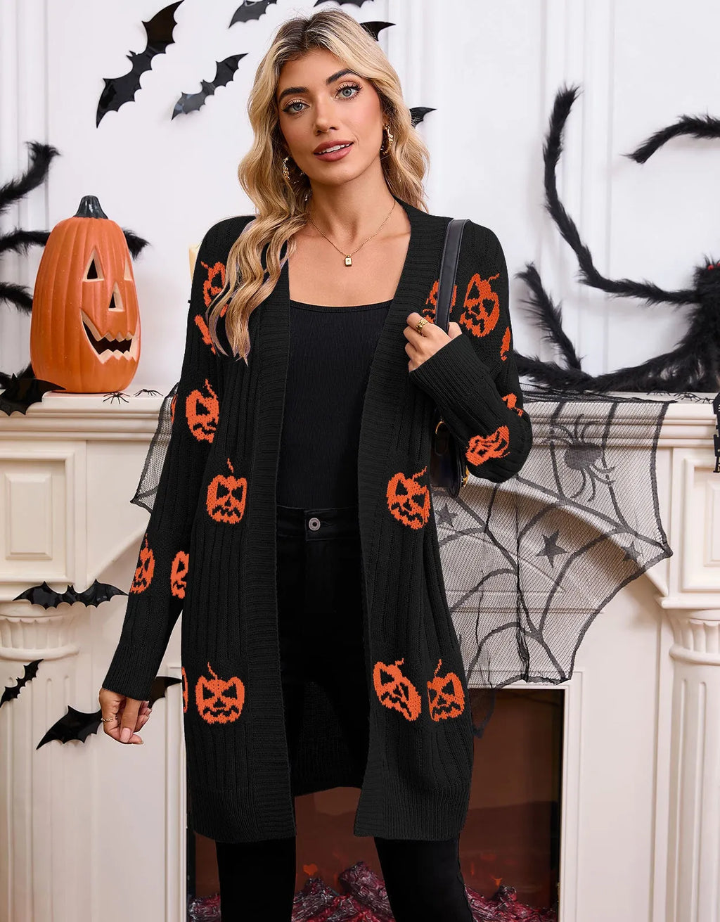 Women's black Halloween cardigan with orange pumpkin head jacquard pattern, medium length