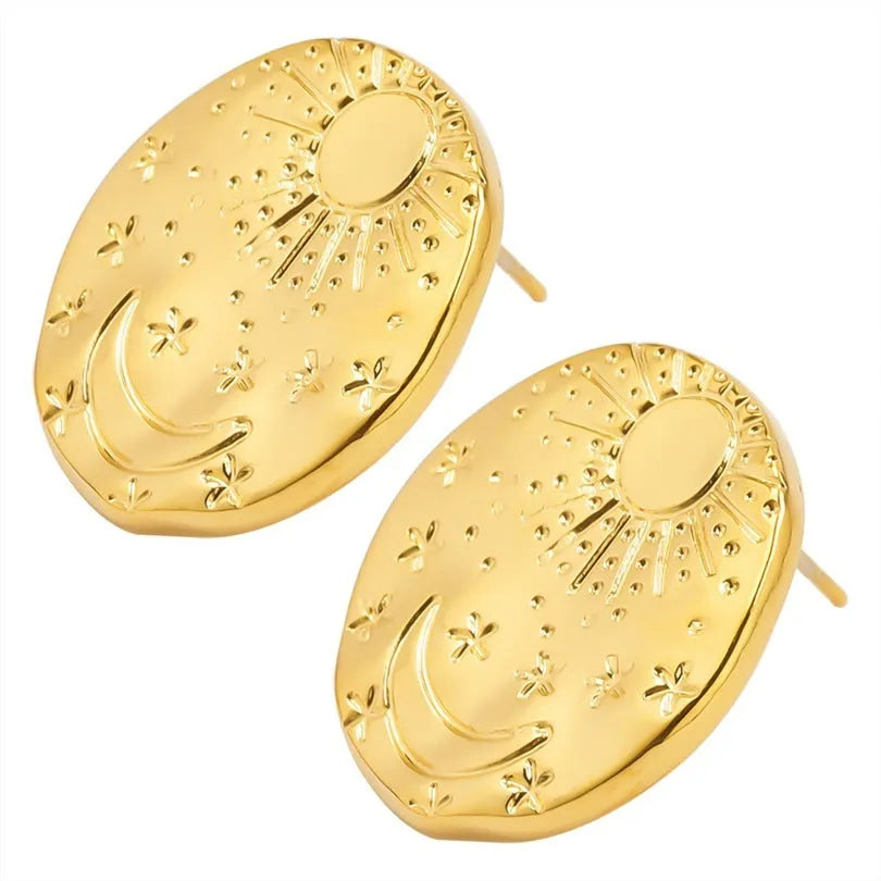 A pair of geometric shell design stud earrings in stainless steel with a gold or silver finish.