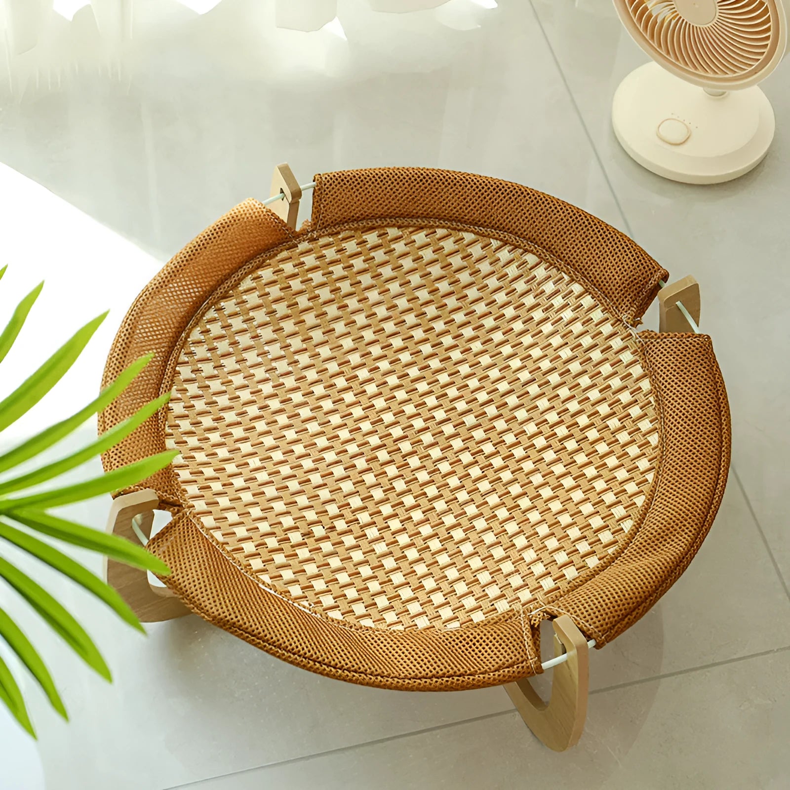 Brown woven rattan raised pet bed for cats and dogs, measuring 46cm square.