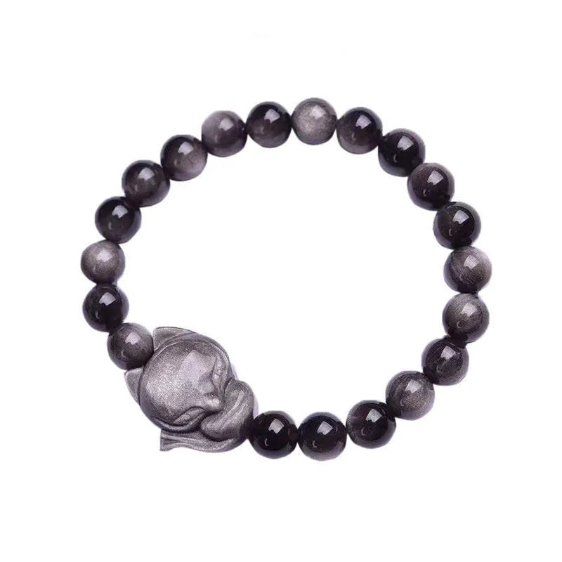 Obsidian fox single ring bracelet showing detailed fox carving on 8mm polished black stone band