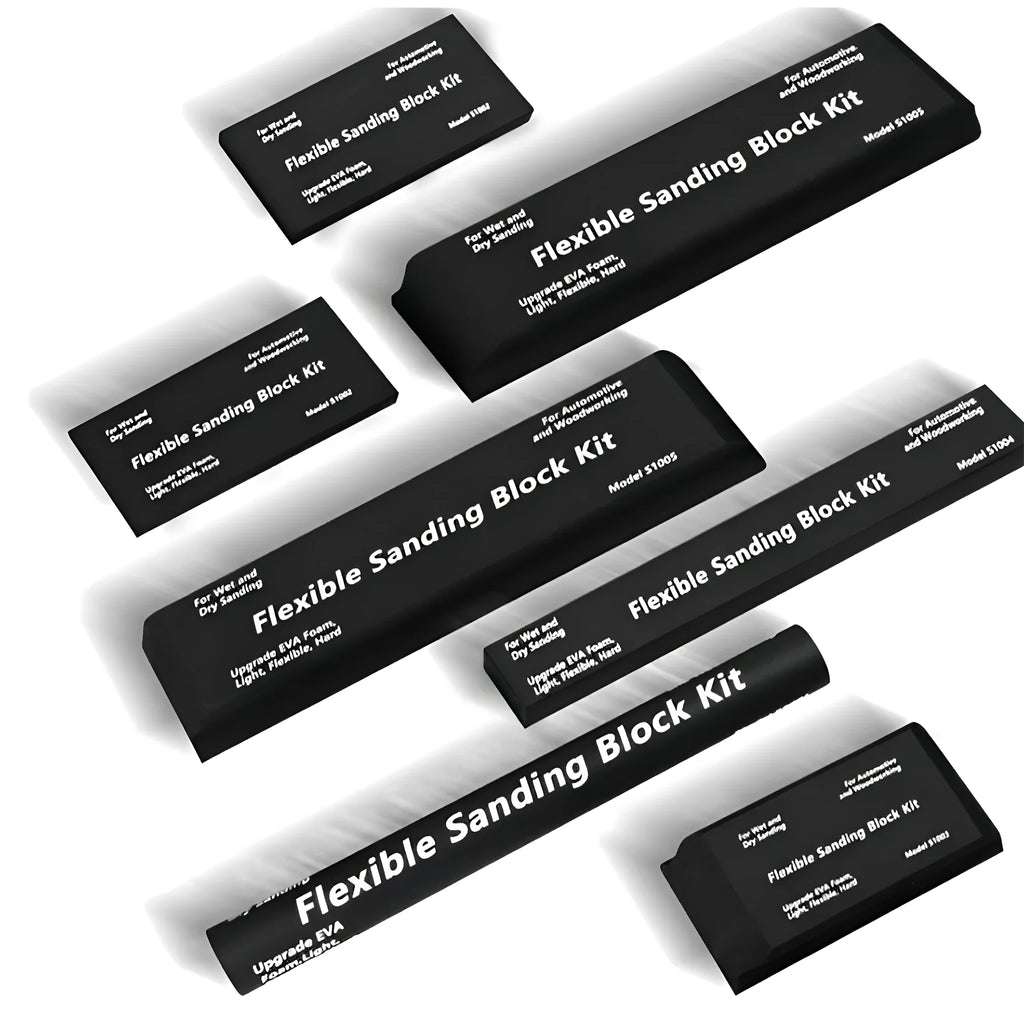 Seven black EVA frosted metal building blocks arranged together