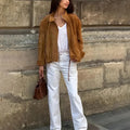 Retro solid colour loose fit polyester jacket with long sleeves on mannequin