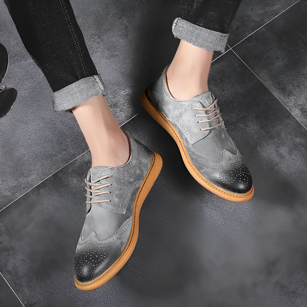 Men's black leather business lace-up shoes with retro stitching on a non-slip rubber sole.