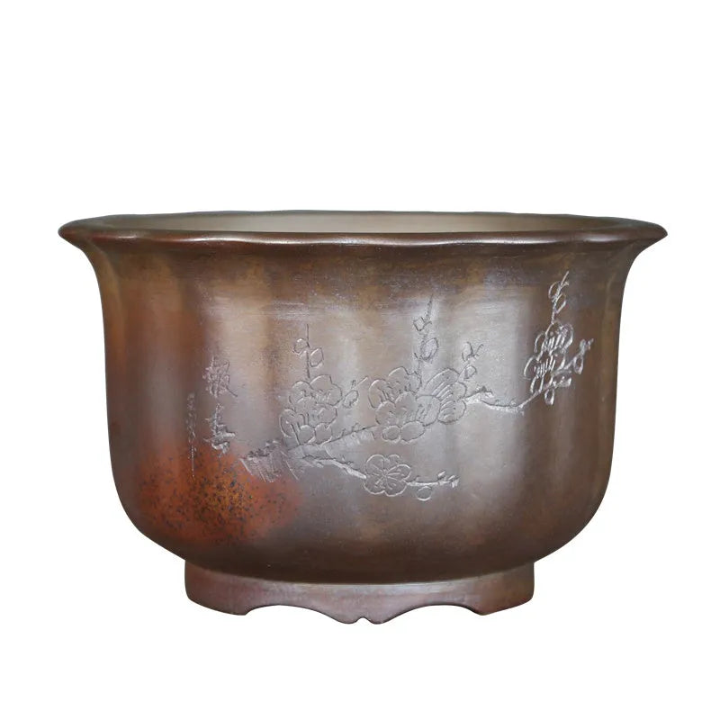 Indoor antique carved purple sand ceramic bonsai pot in classical style with wood burning finish.