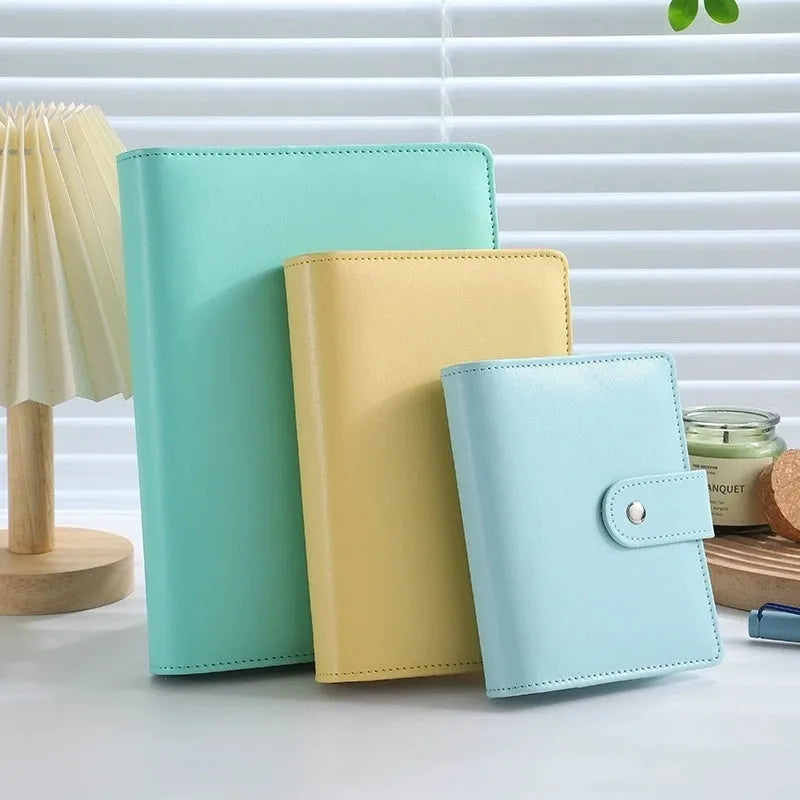 A5 PU leather zipper notebook shell in multiple solid colours, showing closed and open views.
