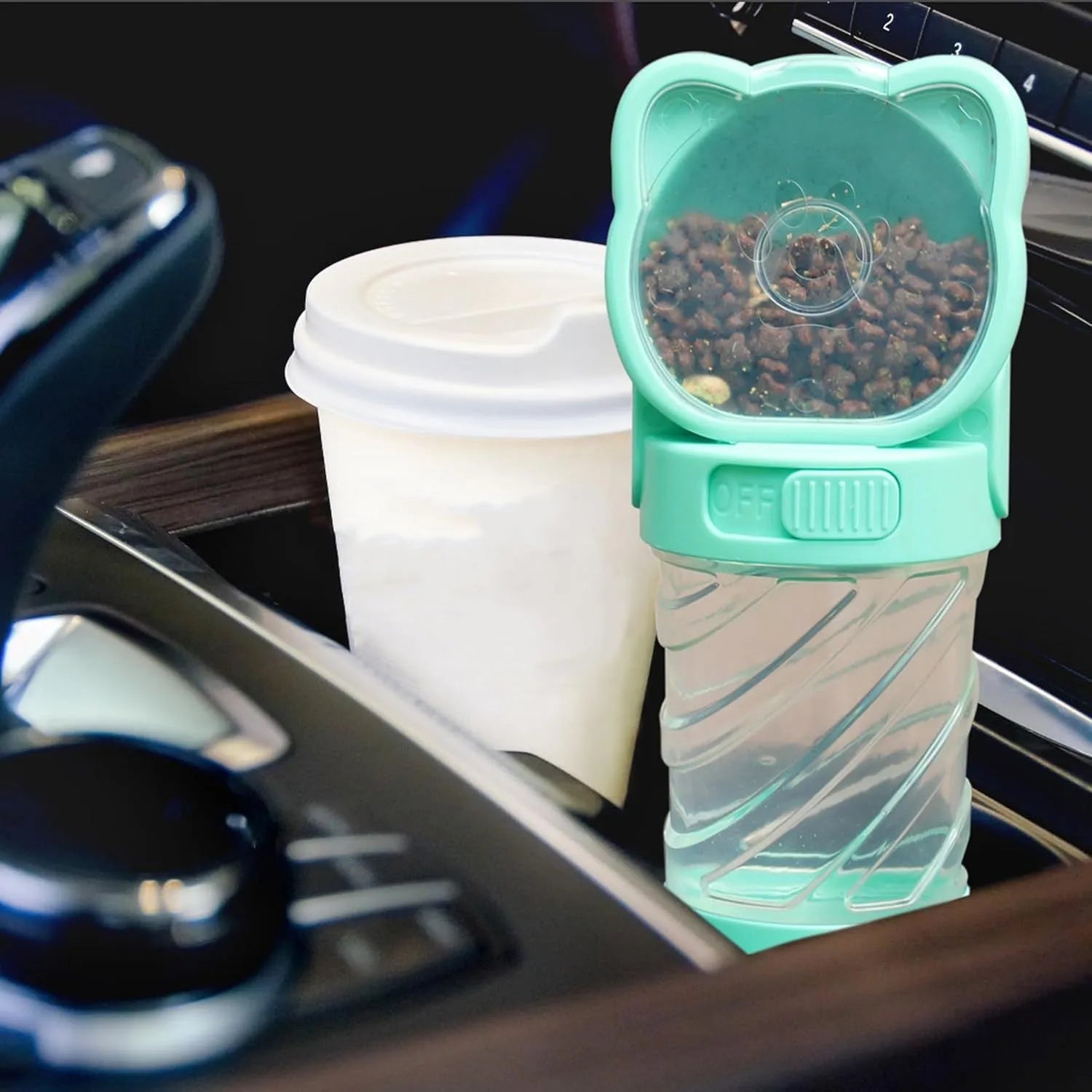Green 3-in-1 portable pet water bottle with food container and waste bag dispenser