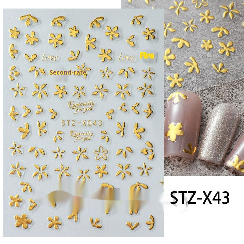 Set of 60 black and silver cartoon pattern nail strip stickers with plastic application patch.