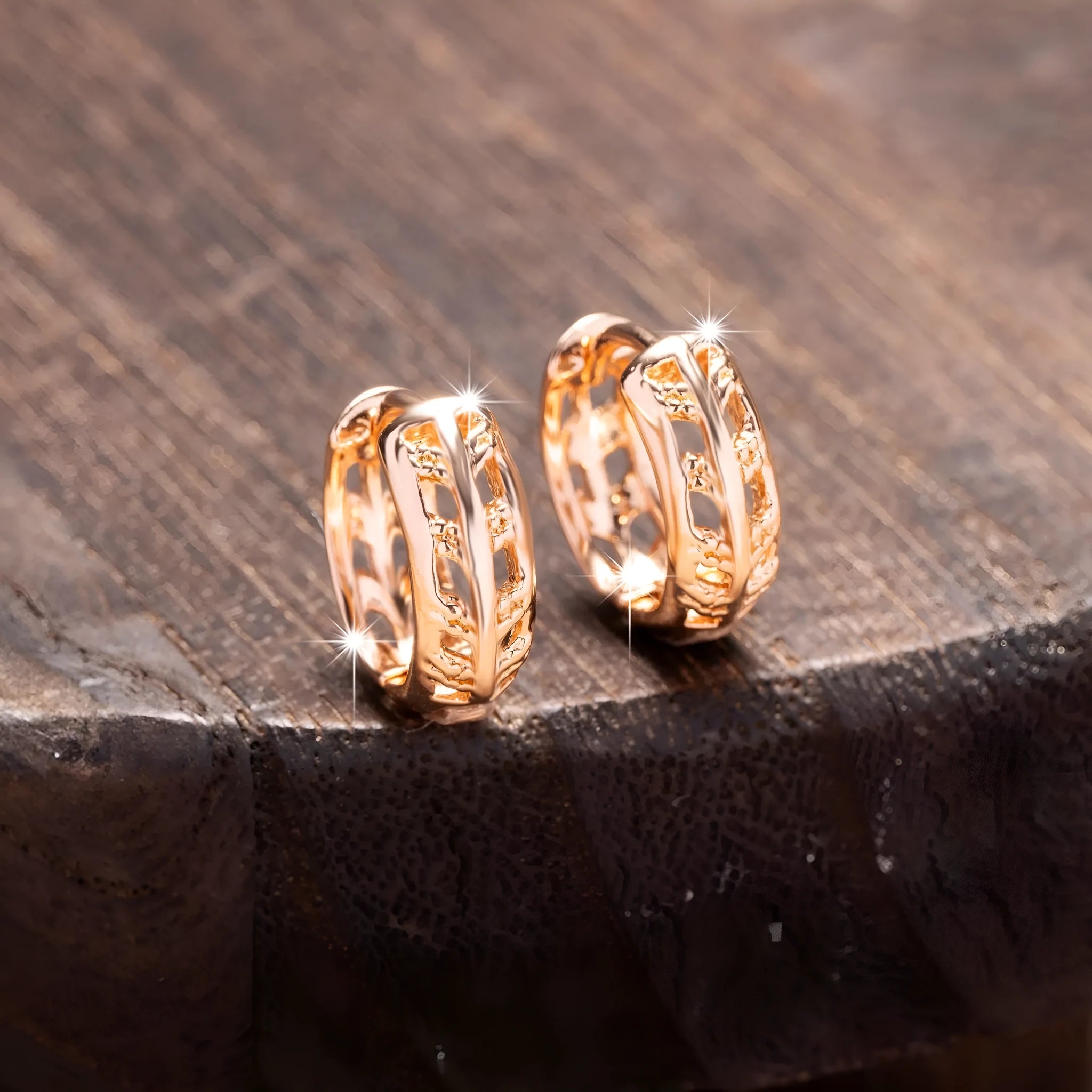 Copper earrings with rose gold finish featuring hollowed-out leaf and heart shapes