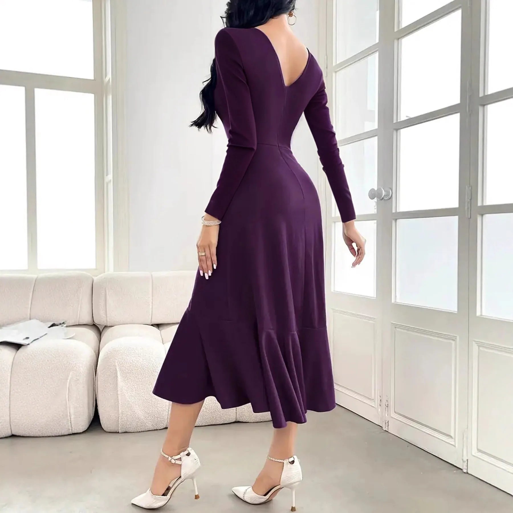 Purple women's dress with ruffles detail and long sleeves