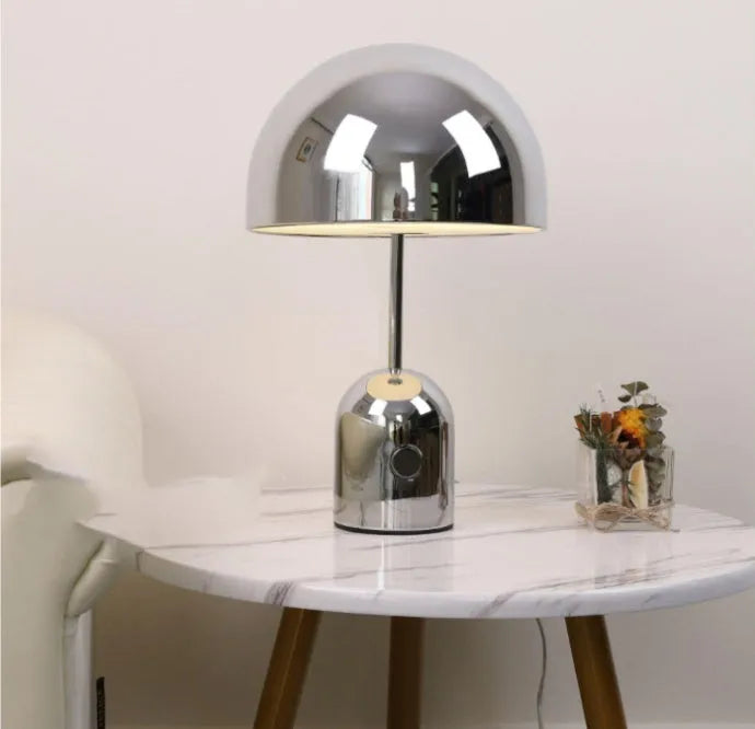Modern mushroom-shaped metal table lamp in rose gold finish measuring 280mm wide