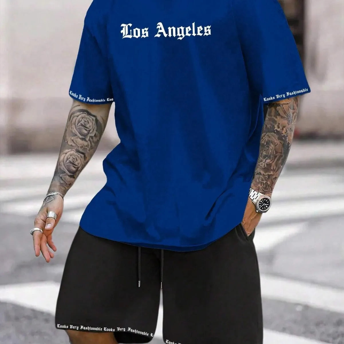 Men's quick-dry polyester sportswear set showing short-sleeved top and matching shorts in a solid colour.
