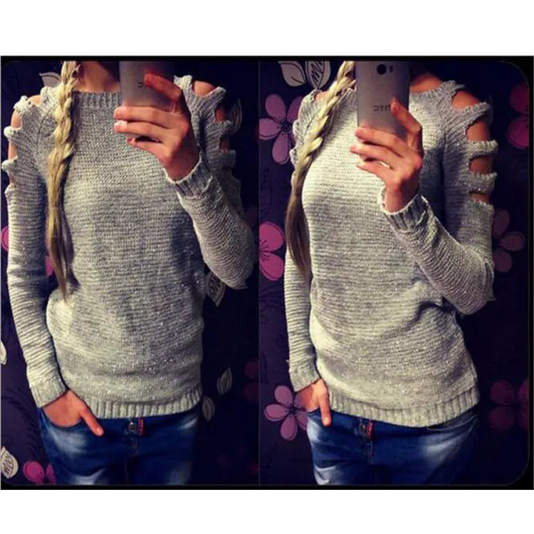 Grey women's knitted shirt with hollow-out crochet pattern, round neck and long sleeves.