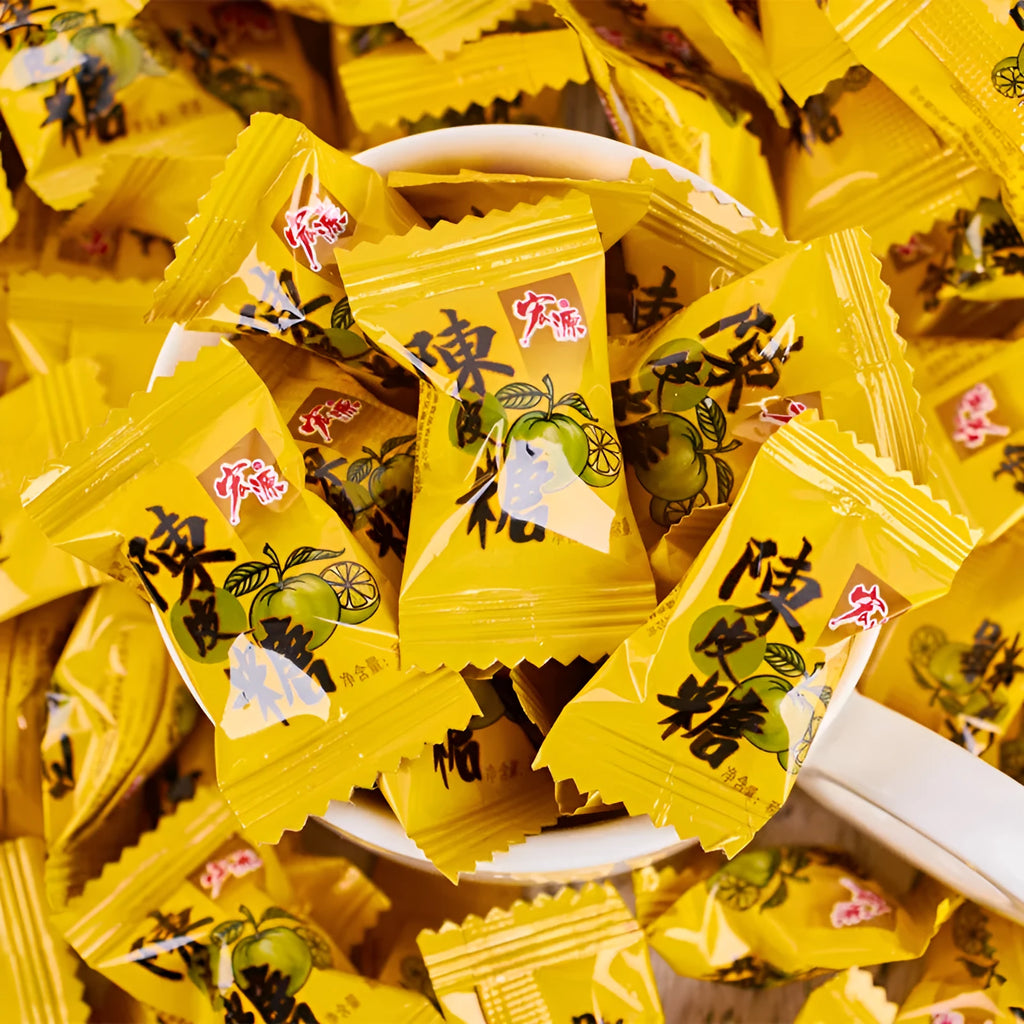 Assorted Chinese fruit flavoured hard candies: guava, plum sugar, and tangerine peel in separate bags.