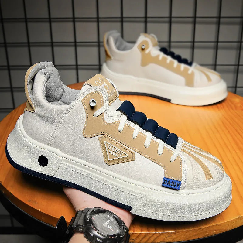 Men's beige low-top sneakers with elastic band closure and round toe on a white background.