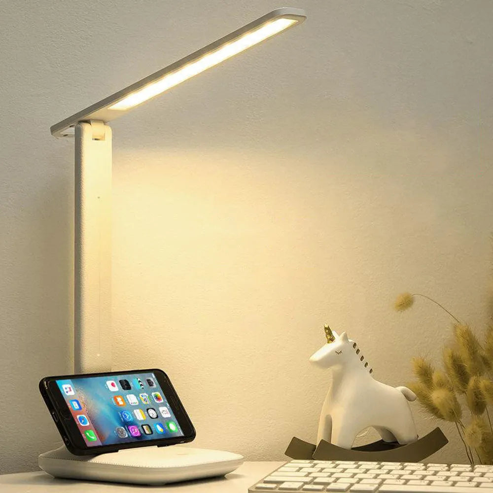 White plastic USB rechargeable bedside lamp with touch dimming controls for children's bedrooms