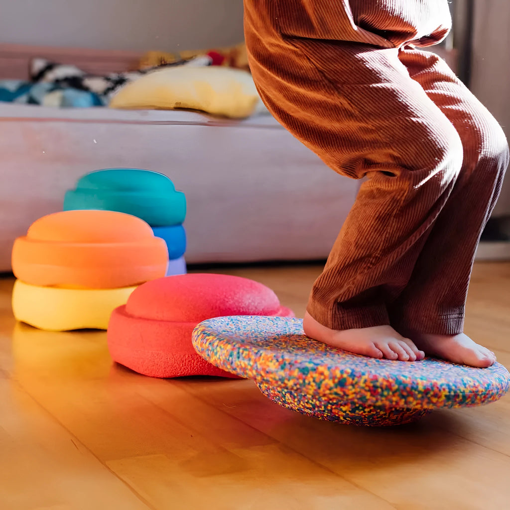 Plastic surf balance board for children in mixed colour wood and black wood designs.