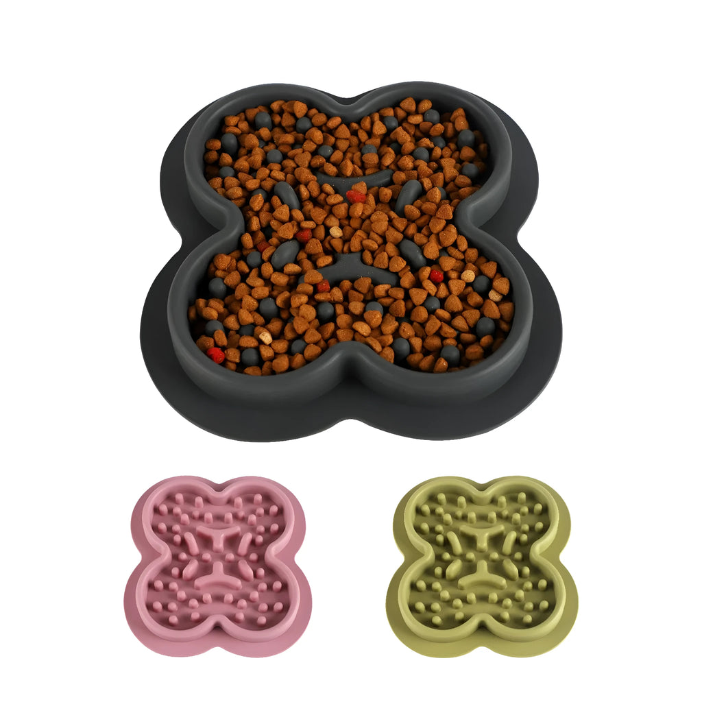 Silicone slow feeder licking pad for cats and dogs on a floor