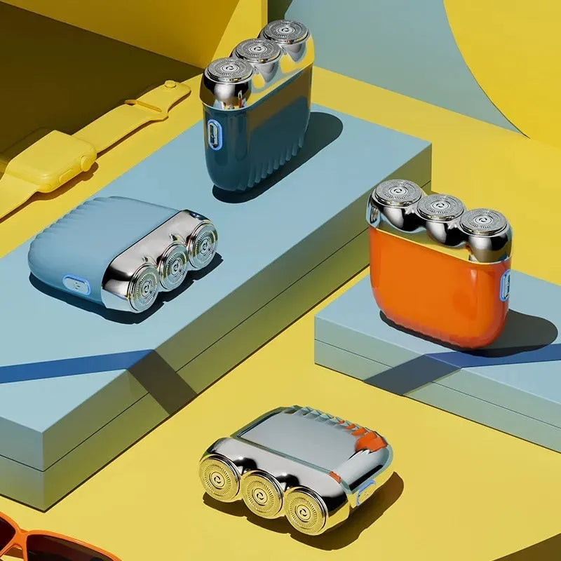 Three-head magnetic mini electric shaver in gun metal, orange, green, or blue colours with floating cutter design
