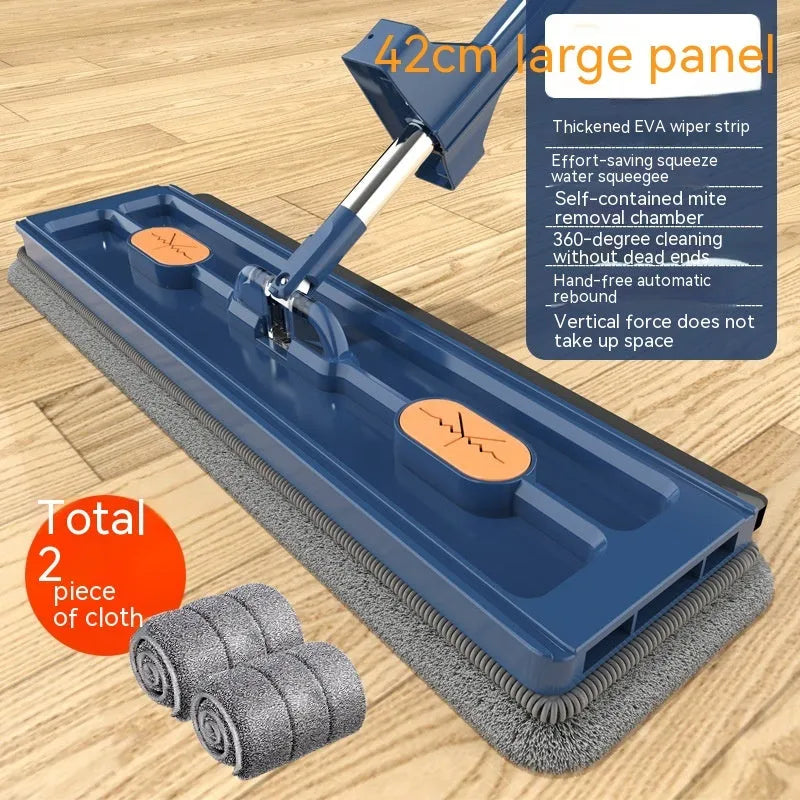 Large flat mop with a long stainless steel handle and a blue microfiber cloth on a hard floor.