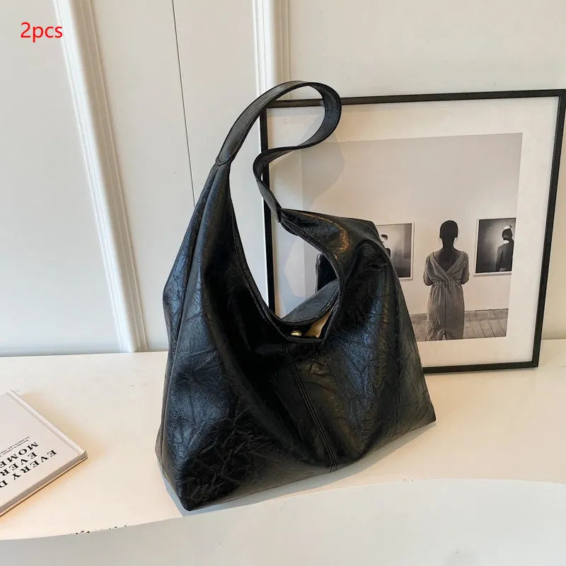 Soft PU leather casual shoulder bag with an adjustable strap, shown in a choice of colours.