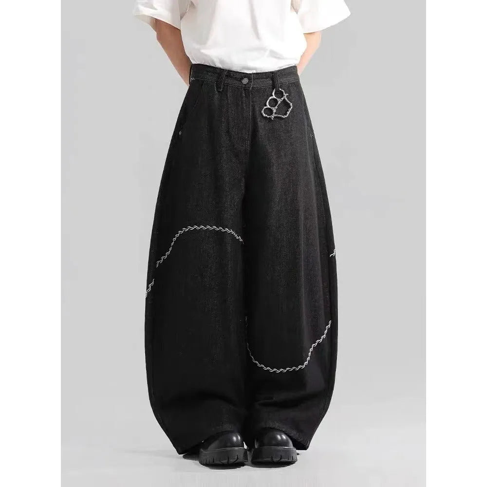 Black straight-leg denim trousers with mid-waist and zip fly for autumn winter wear