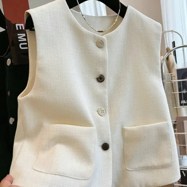 French style bandage vest for women with round neckline and sleeveless design in milky white colour