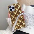 iPhone phone case with attached diamond bracelet chain accessory in gold or silver design