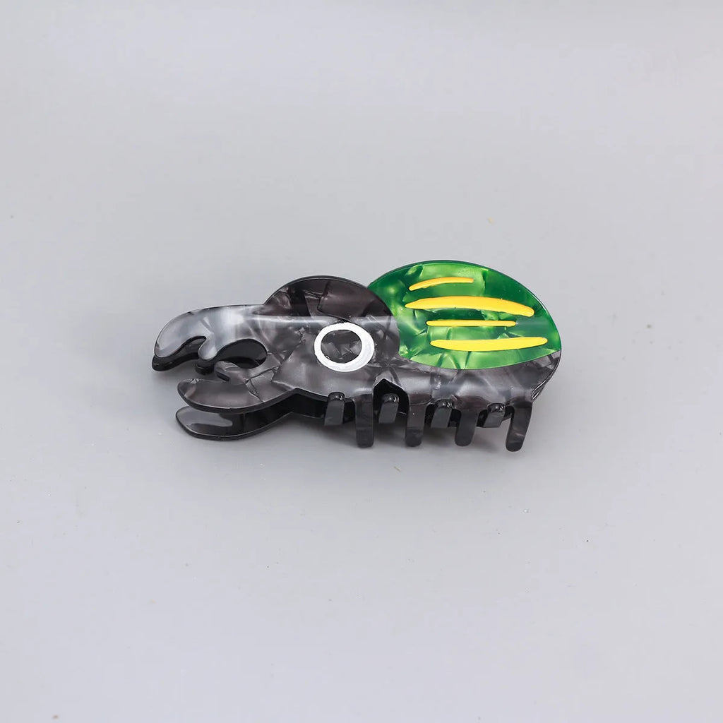 Cellulose acetate beetle grip with insect biology design in green, orange, or white colour options