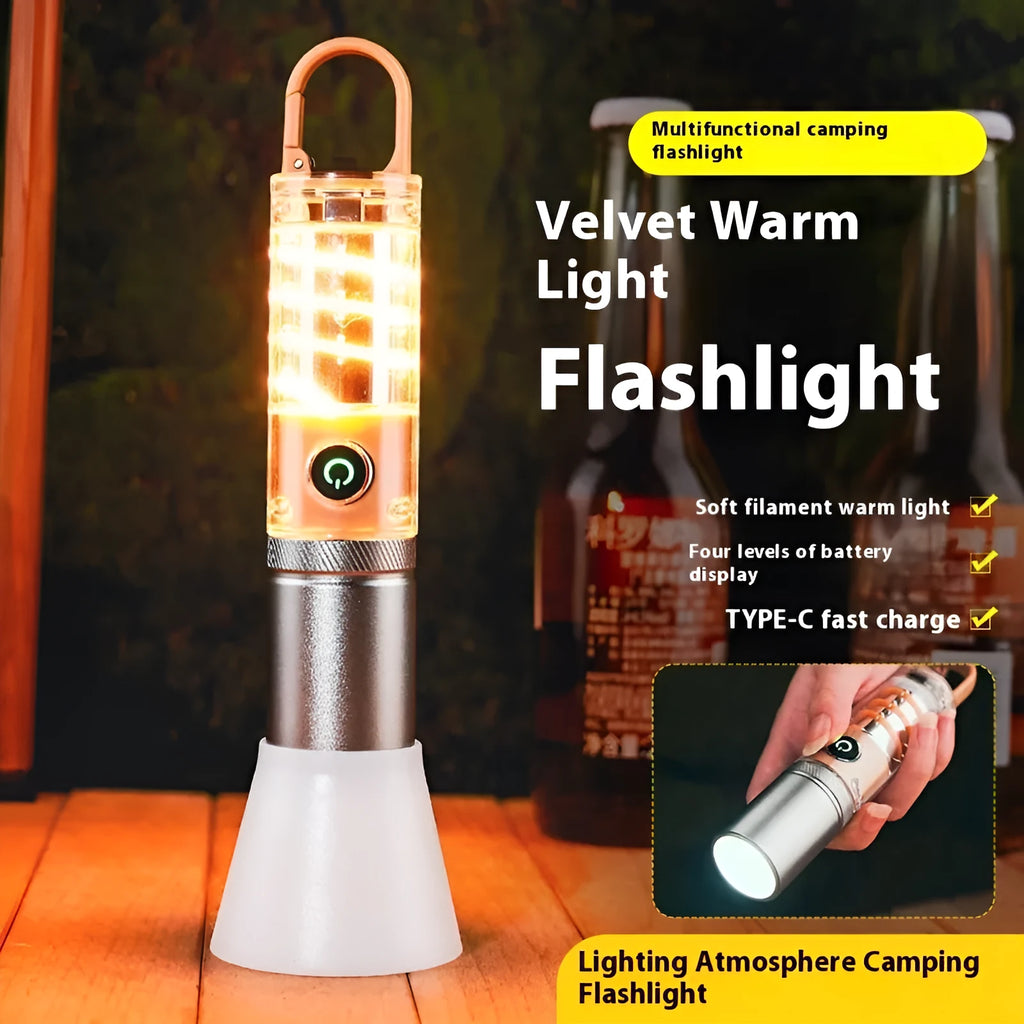 Orange and beige multifunctional flashlight with magnetic hook and optical zoom lens.