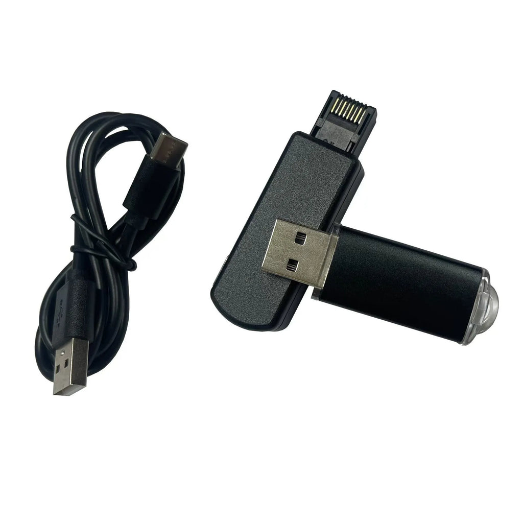 Black aluminum alloy JB Tool USB adapter for console firmware switching with Ethernet port.