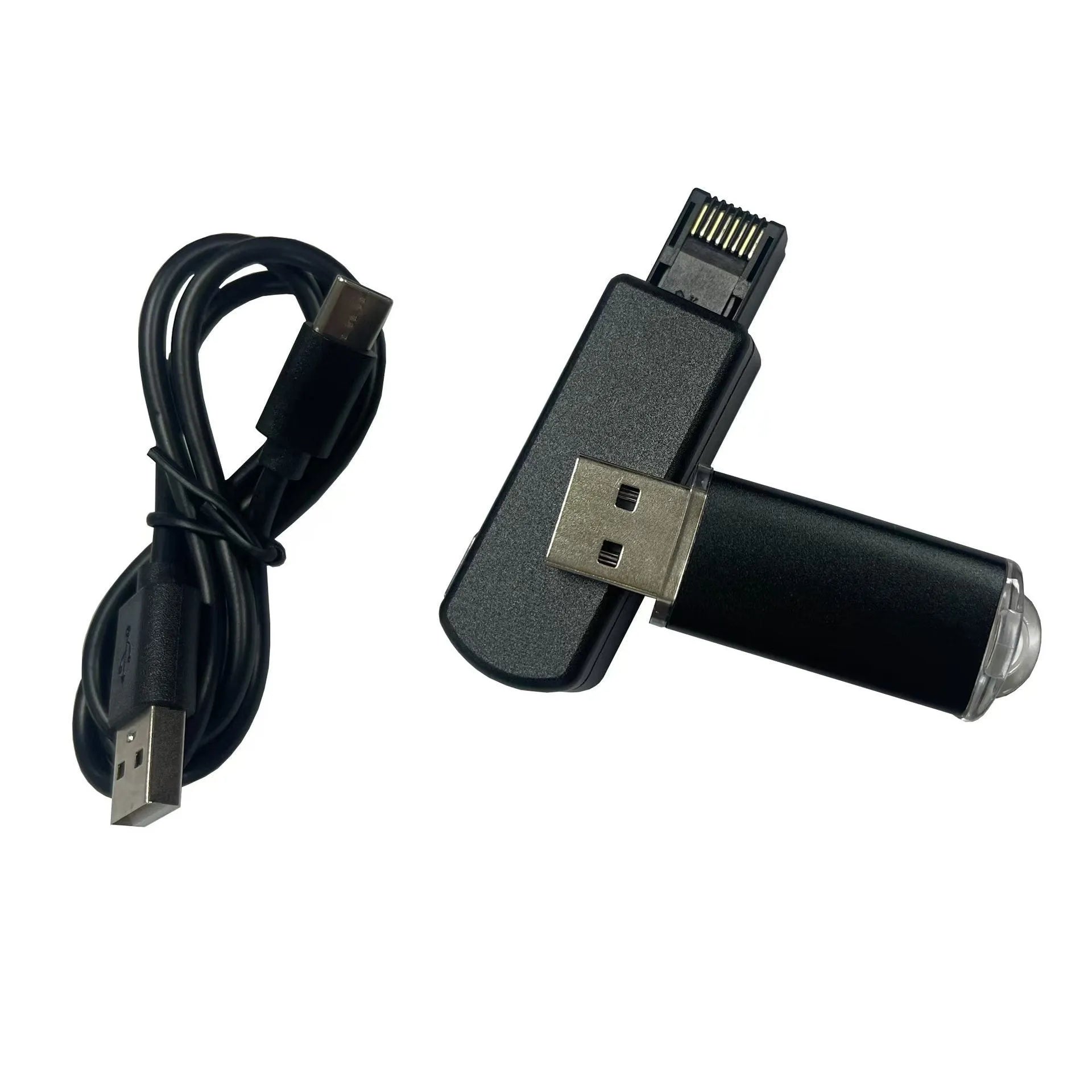 Black aluminum alloy JB Tool USB adapter for console firmware switching with Ethernet port.