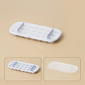 High capacity food grade plastic ice cube tray in blue with an ice shovel stored in its dedicated slot.