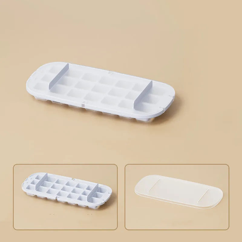 High capacity food grade plastic ice cube tray in blue with an ice shovel stored in its dedicated slot.