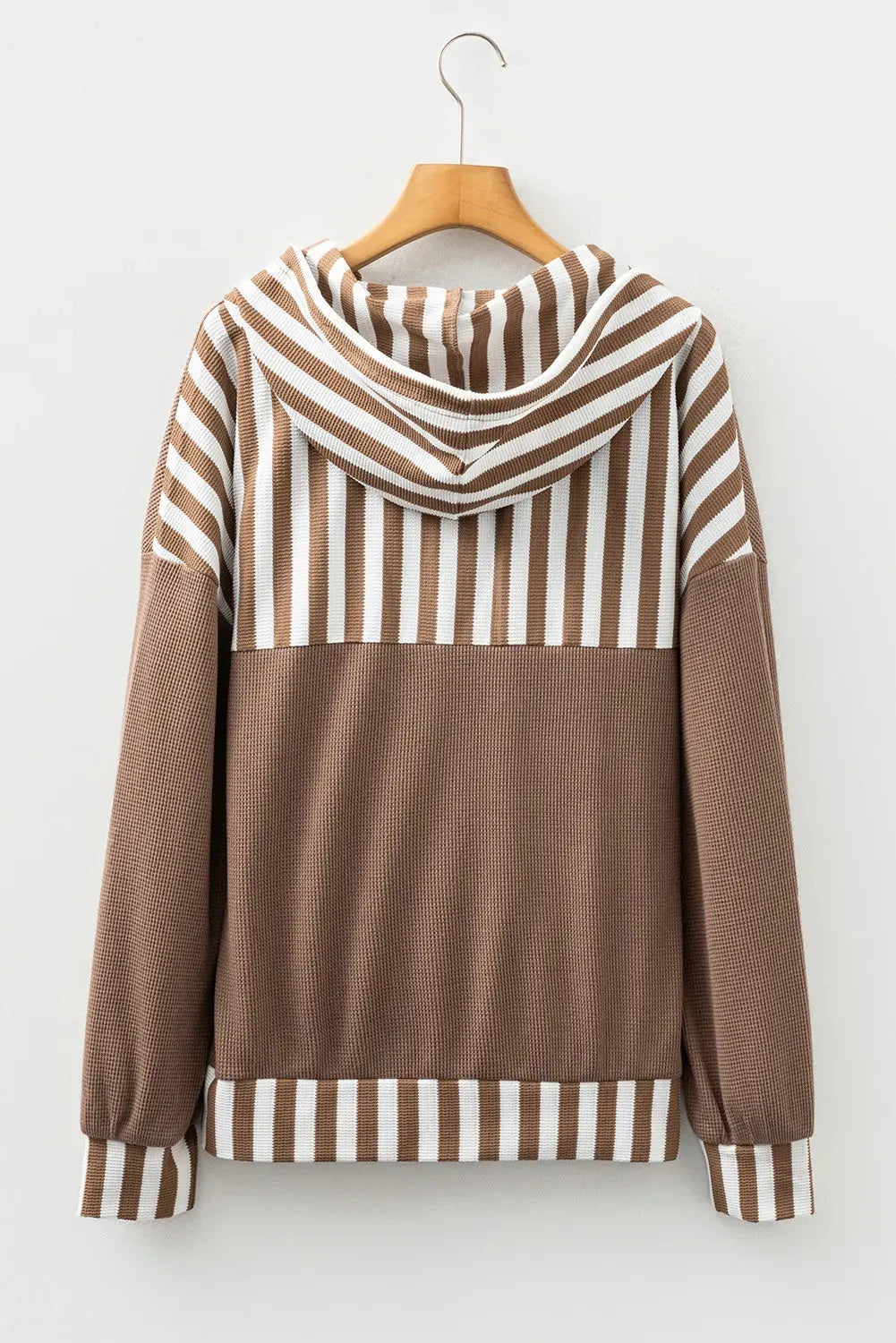 Straw yellow hoodie with waffle texture striped patchwork design featuring drawstring hood and button neck closure