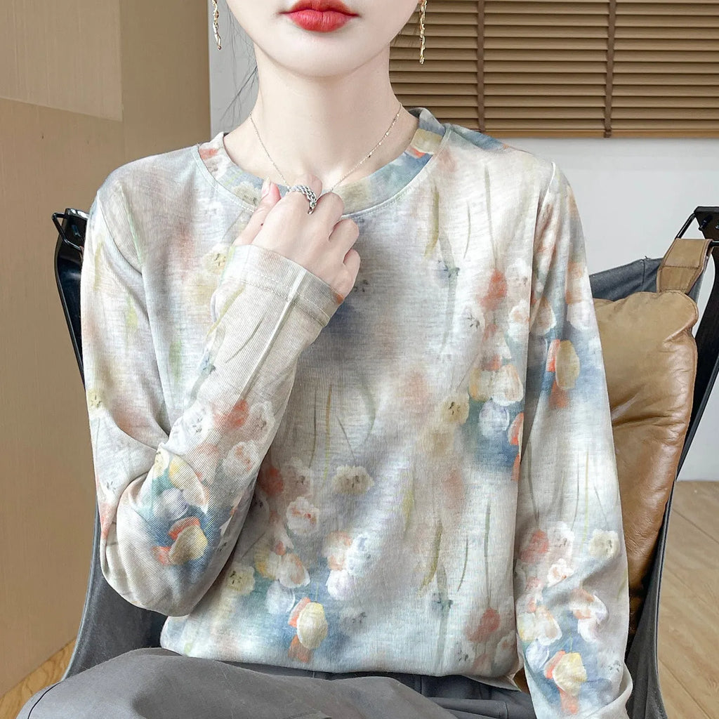 Floral print round neck pullover shirt in Tencel cotton fabric on hanger