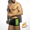 Men's black polka dot quick-dry swimming boxers briefs on a white background.
