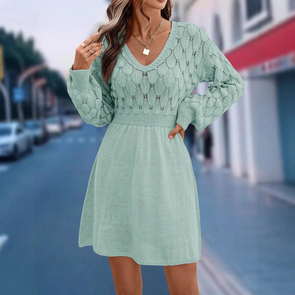 Women's artistic retro V-neck long sleeve beach dress with high waist and 3D patterns.