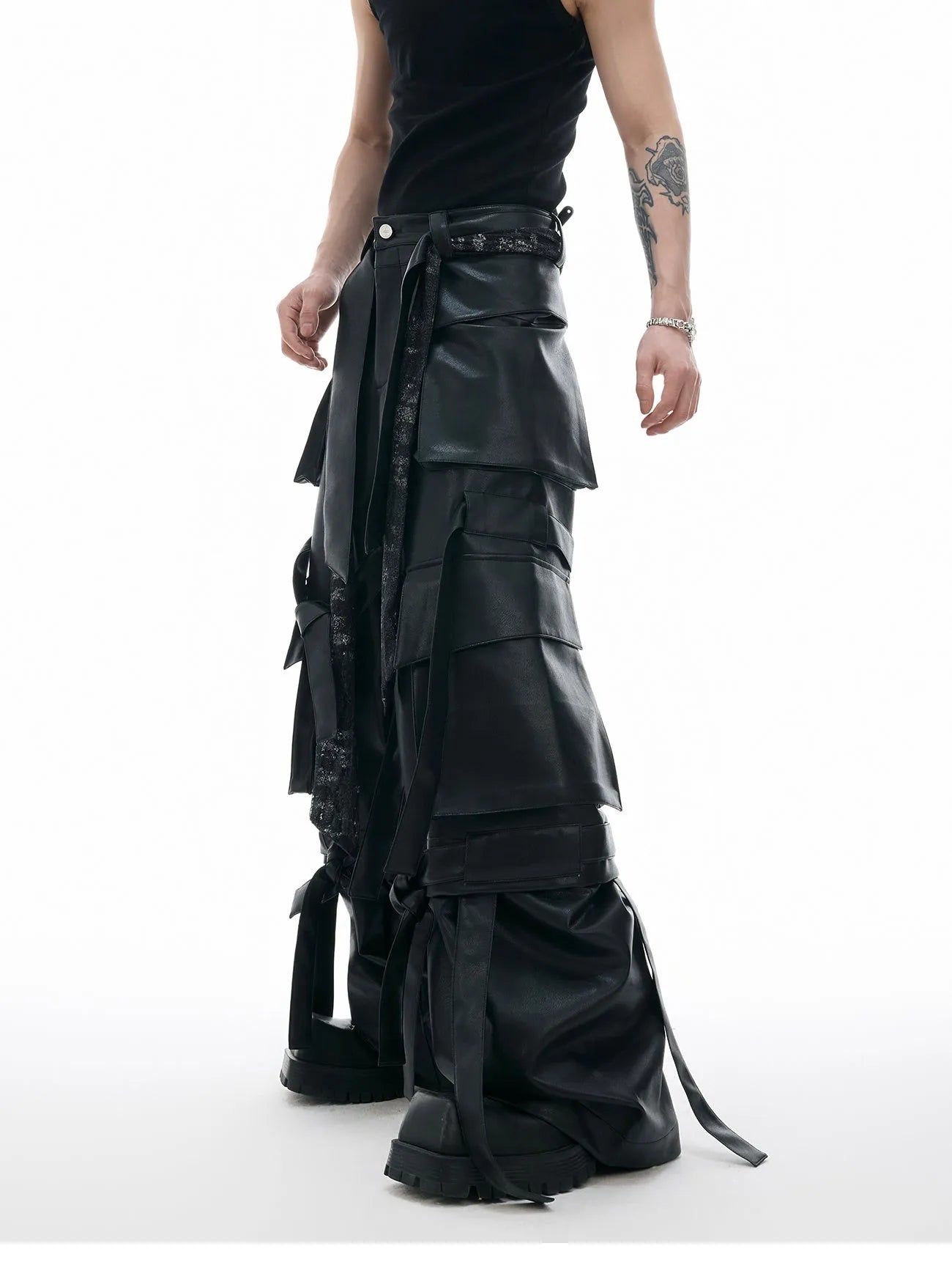 Men's black quilted loose fit trousers with ribbon stitching and multiple pockets