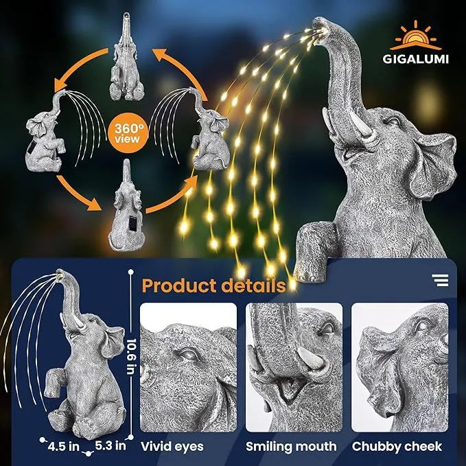 Grey resin elephant garden statue with white LED string lights wrapped around its body.