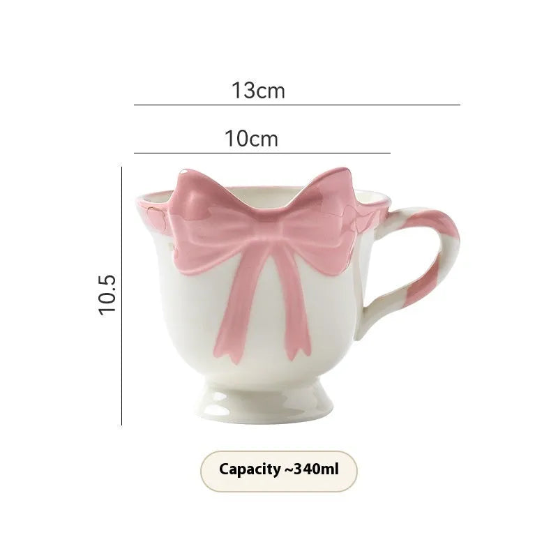 Ceramic heart bow mug with 350ml capacity in black pink colour option
