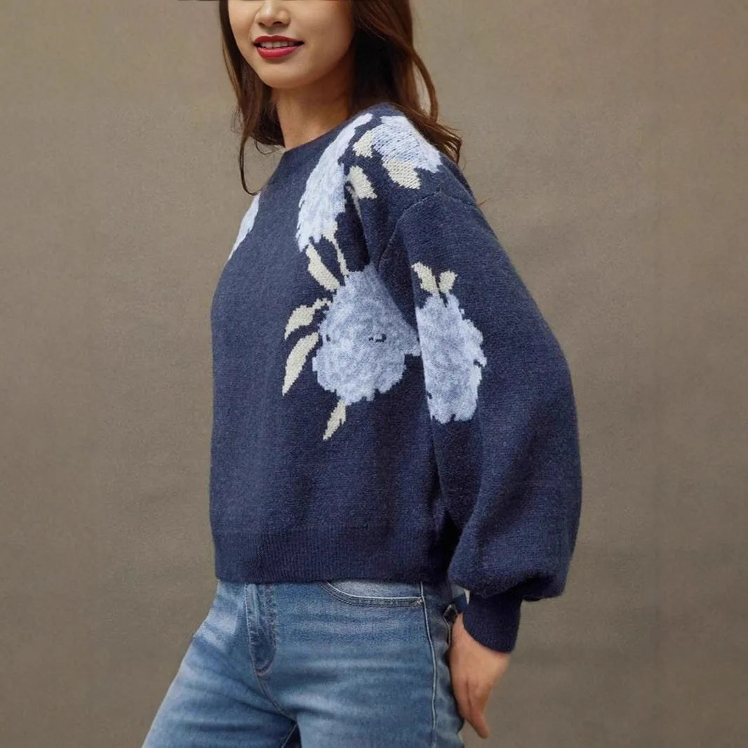 Sapphire blue women's pullover with floral jacquard pattern, off-neck collar, and loose fit