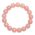 Pink crystal barrel bead bracelet with geometry design on wrist