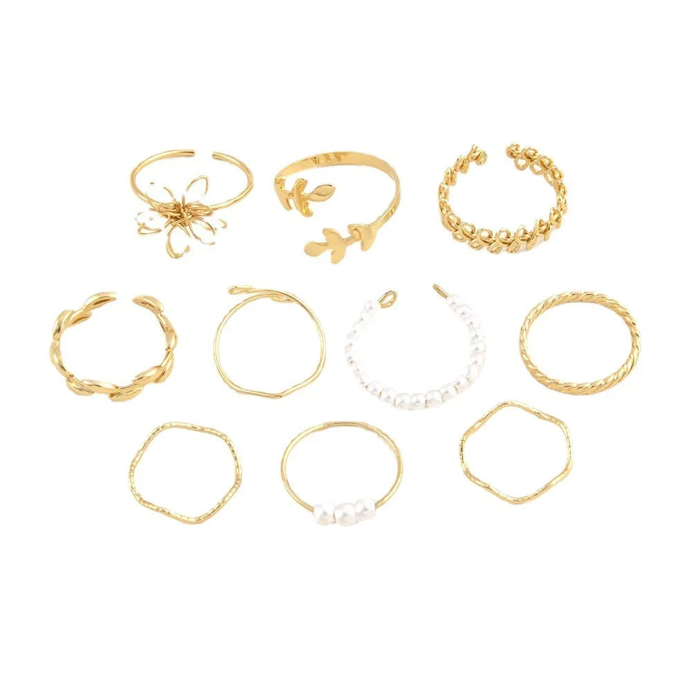 Gold colour openwork flower ring with electroplated glossy finish and floral design