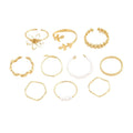 Gold colour openwork flower ring with electroplated glossy finish and floral design