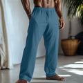 Cotton and linen straight leg casual trousers in British style with pockets, shown in light green colour