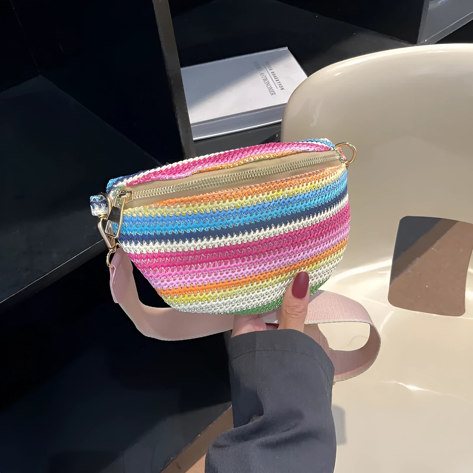Women's pink and blue bohemian straw beach bag with shell shape and shoulder strap